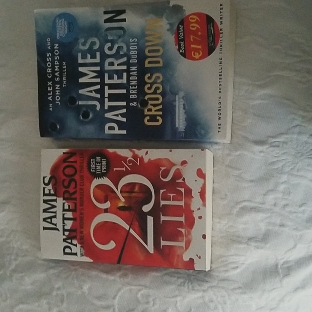 2 James Patterson books Cross Down and 231/2 Lies .